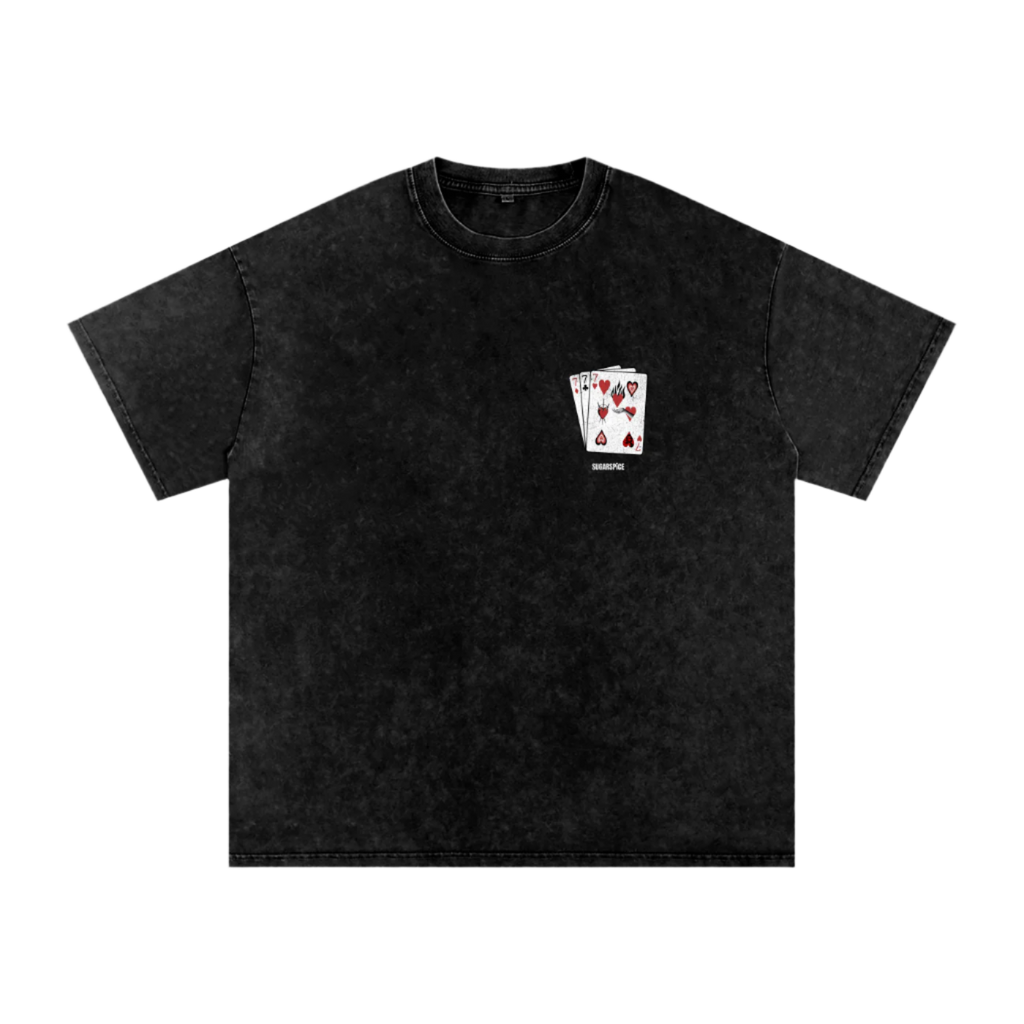 Black t-shirt with a small graphic of playing cards on the chest against a white background